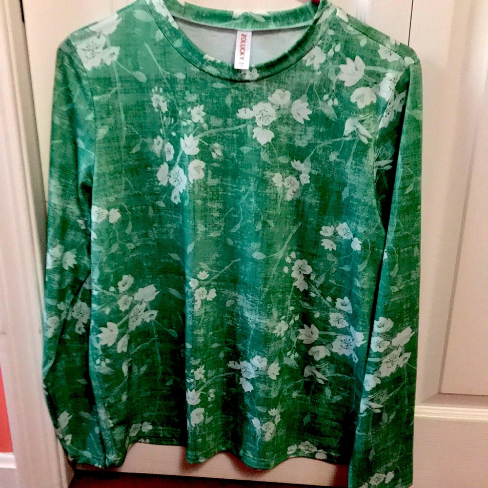 Long sleeve green printed blouse. Brand new never worn